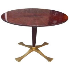 A Round Center or Breakfast Table in Mahogany by Dassi