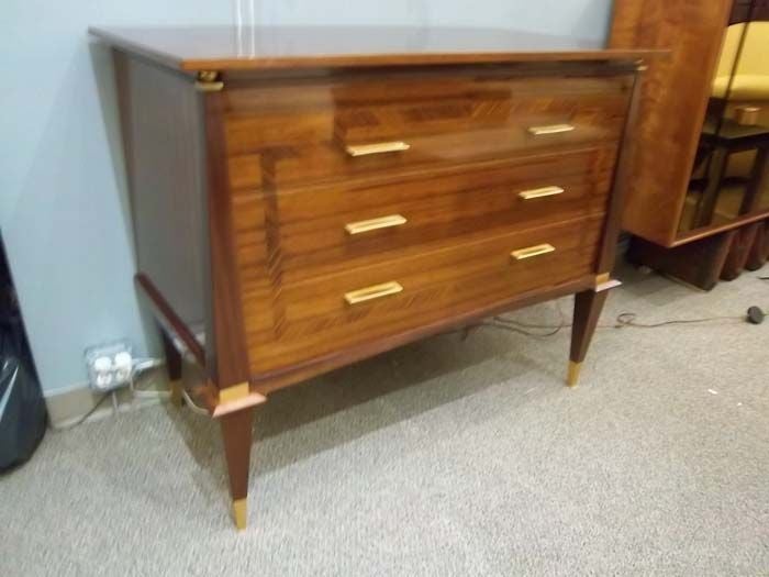 A Modernist Three Drawer Commode in Rosewood