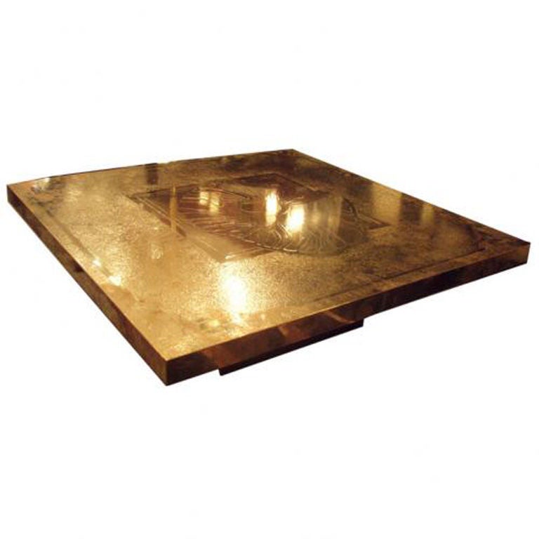 A Large Square Modernist Cocktail Table in Etched Brass