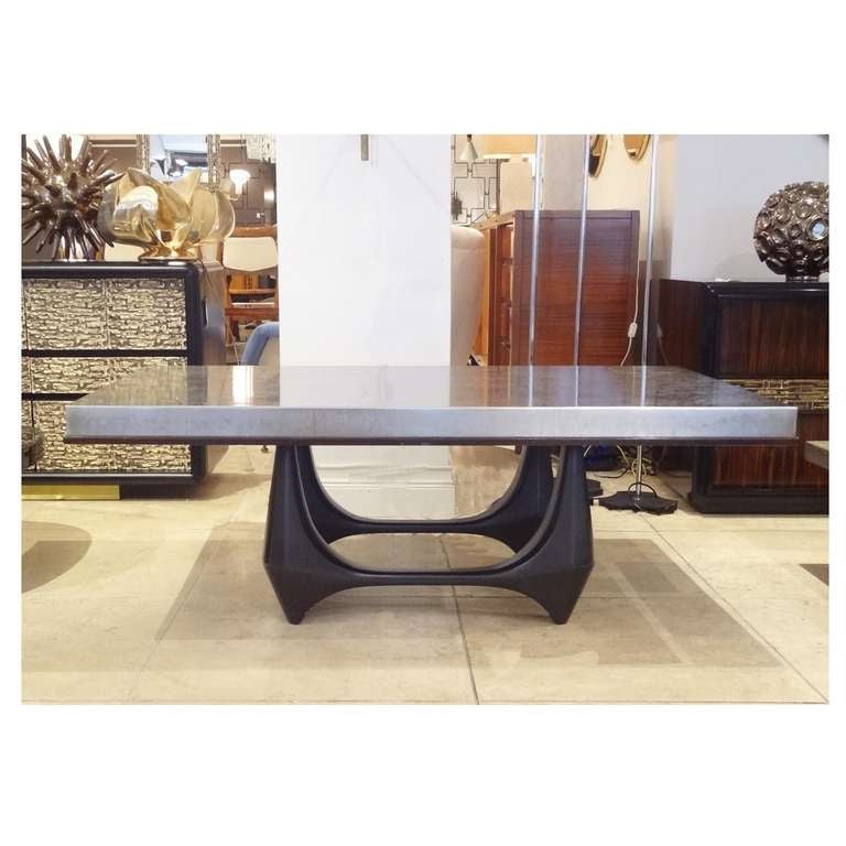 A modernist cocktail table featuring a shaped black lacquered four leg base with a top composed of a acid etched steel top in a abstract pattern with a thin wood edge. Hans Kelbeck, Belgium circa 1965.