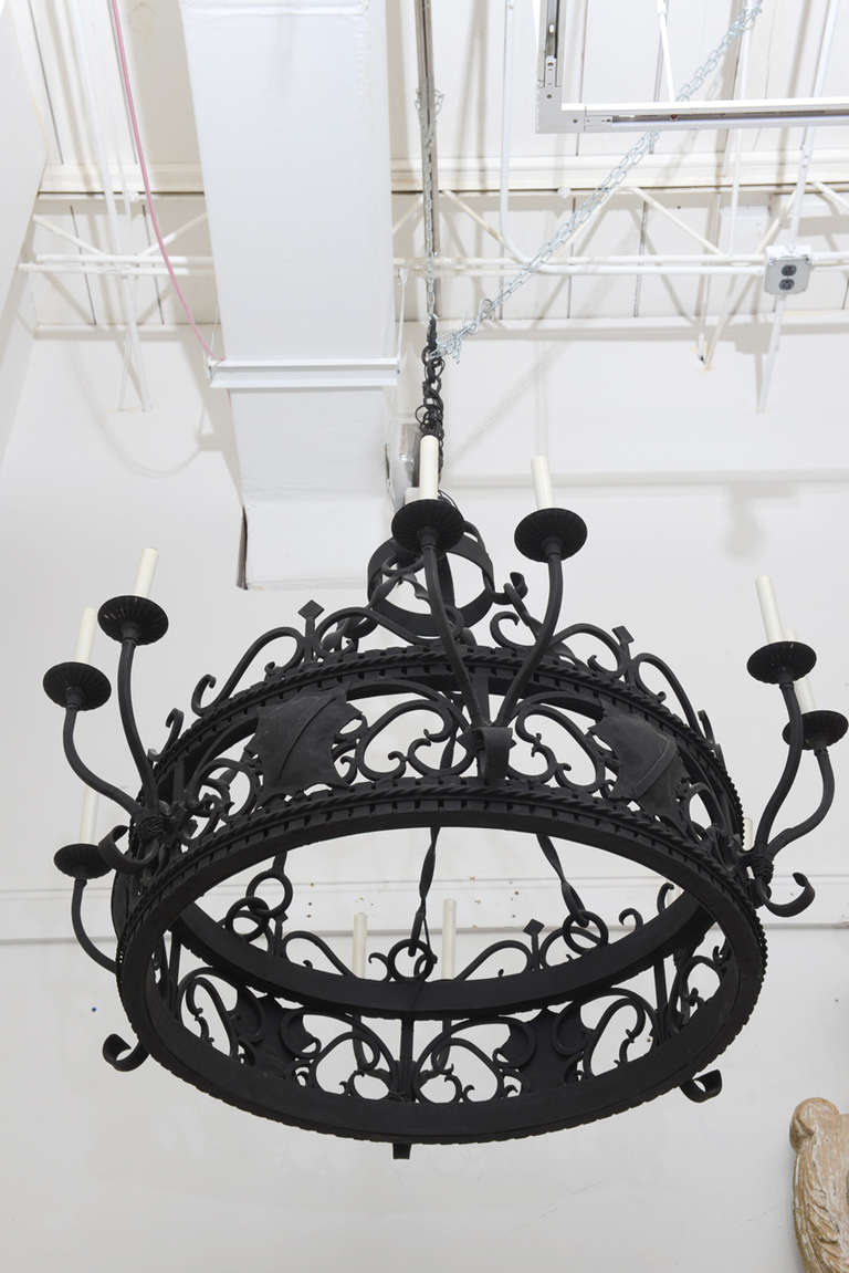 Cast, wrought and welded chandeliers with 12 lights