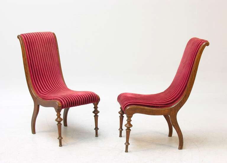 The chairs with turned front legs and S-curved back legs.