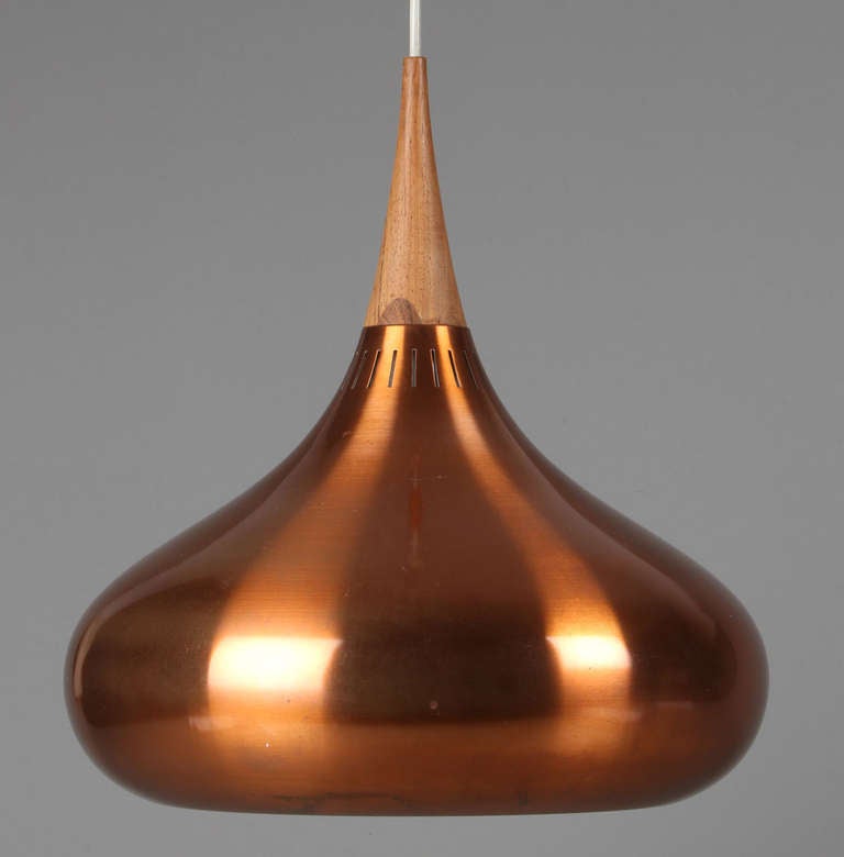 Danish copper pendant light with teak top titled 