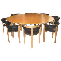 Danish Dining Table and Eight Chairs by Johnny Sorensen and Rud Thygesen