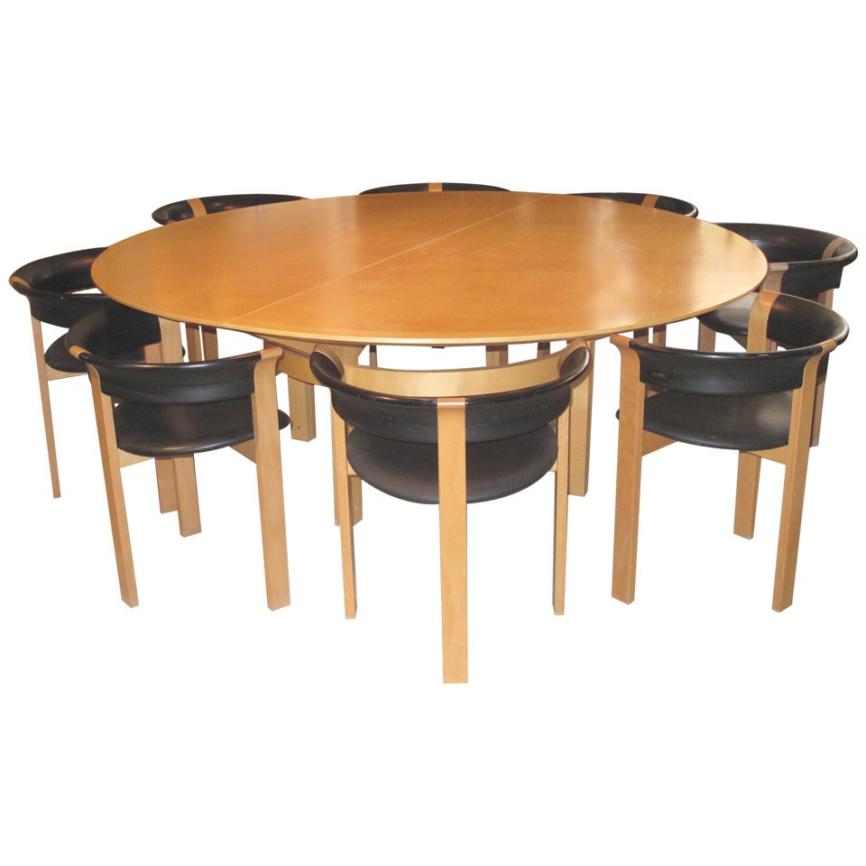 Danish Dining Table and Eight Chairs by Johnny Sorensen and Rud Thygesen For Sale