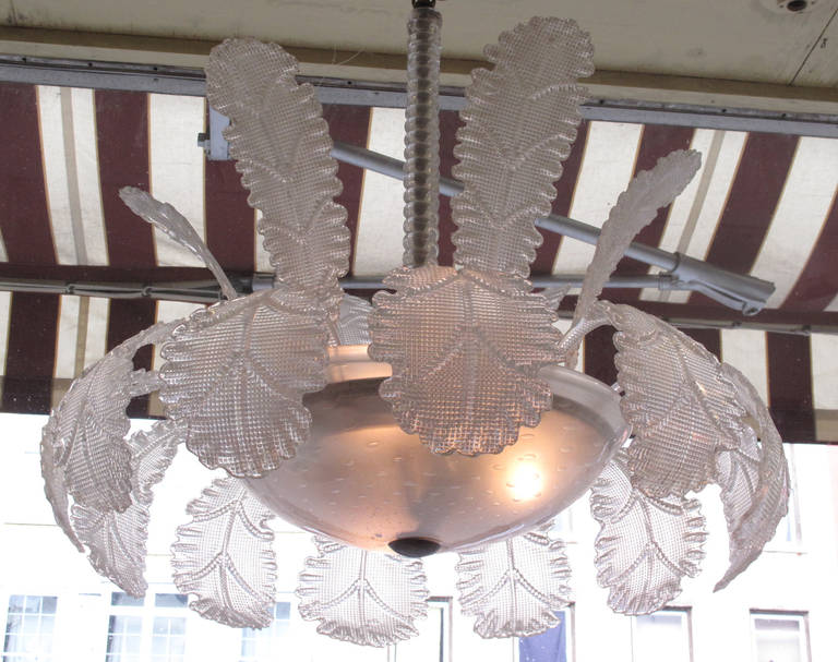 The chandelier mounted with upright and down-curved glass leaves. Possibly by Barovier e Toso