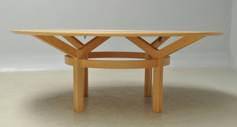 Laminated Danish Dining Table and Eight Chairs by Johnny Sorensen and Rud Thygesen For Sale