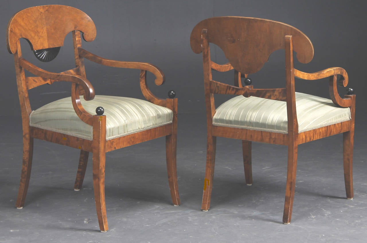 Pair of Swedish neoclassical style birch armchairs with ebonized decoration, circa late 19th century.