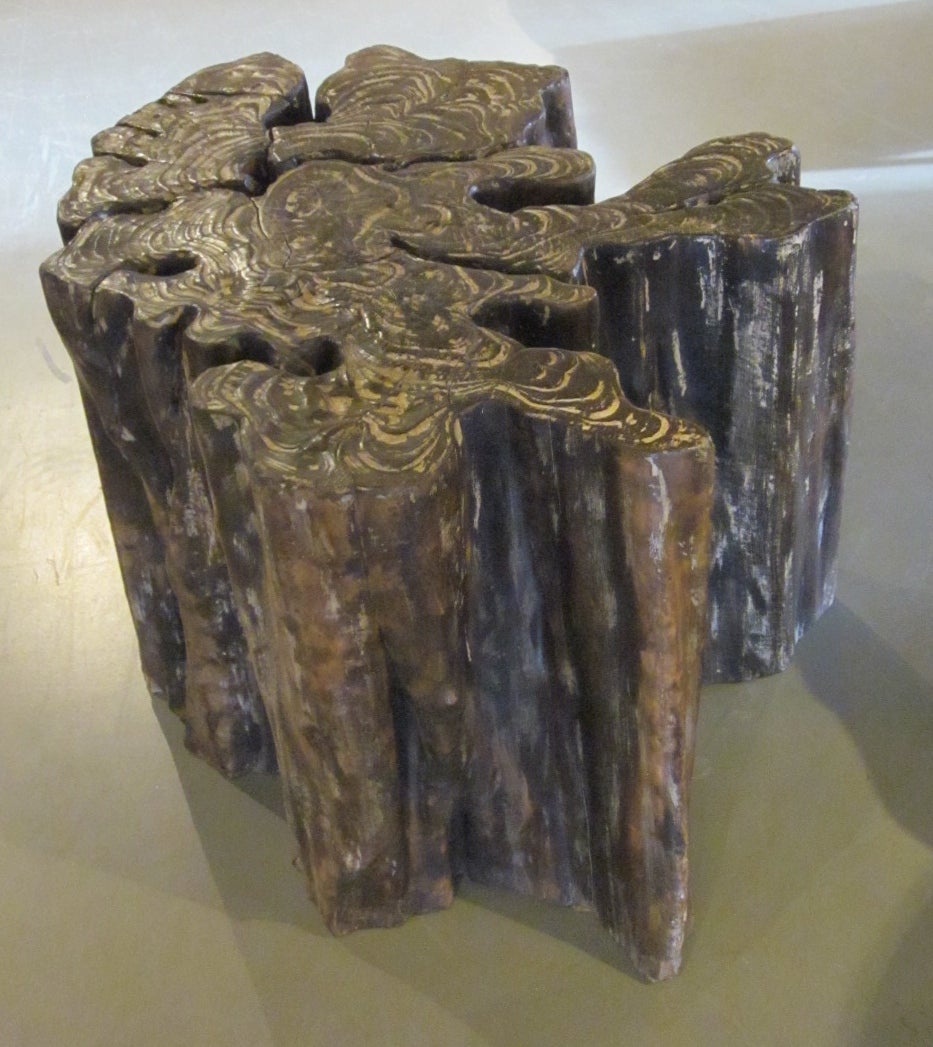 Free form side table made of wood from a Banyan tree.  Very interesting organic shape.