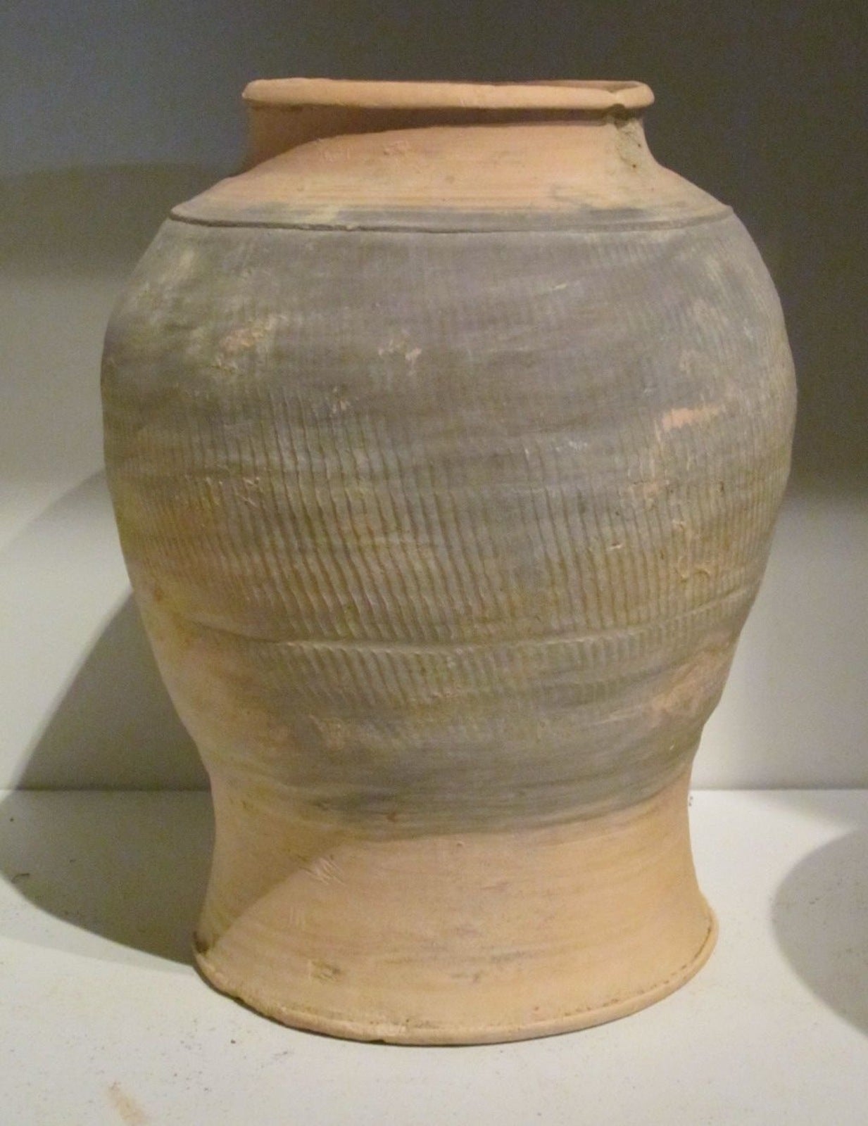 North Vietnamese textured terra cotta pots that were used as food vessels.
Each pot varies in size and texture.
Sizes range from 7