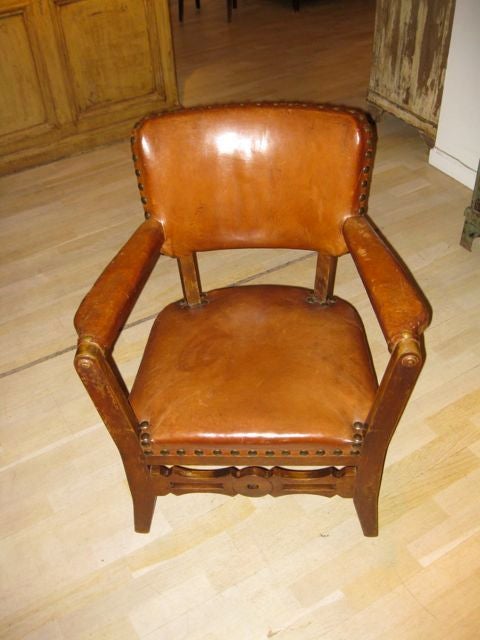 Pair of English 19thC Leather Arm Chairs
