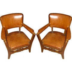Pair of English 19thC Leather Arm Chairs