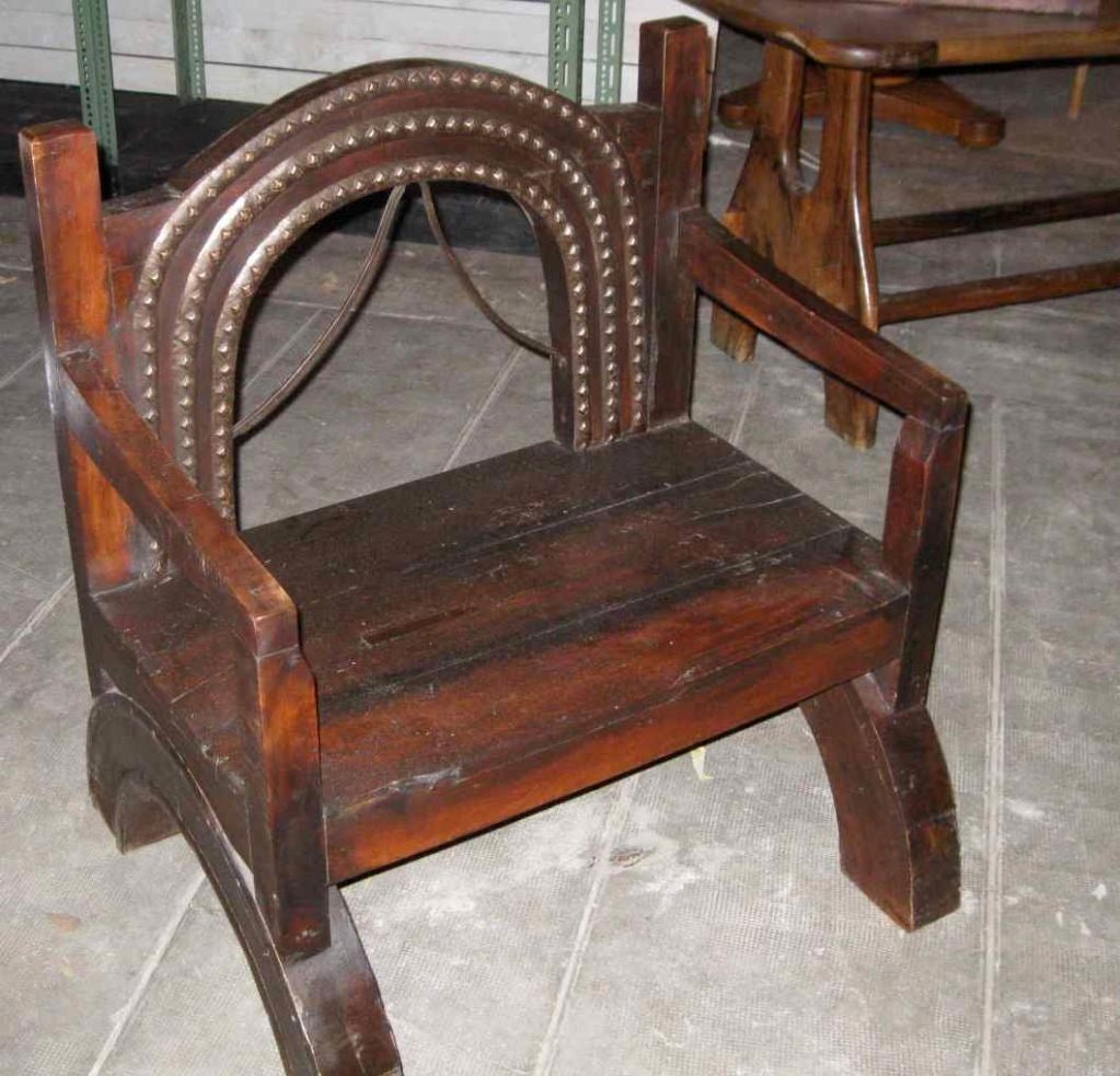 1920's African Arm Chair With Stud Accents