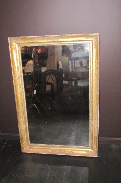 19th century French decorative gold gilt wooden rectangular wall mirror. Can hang in either direction.