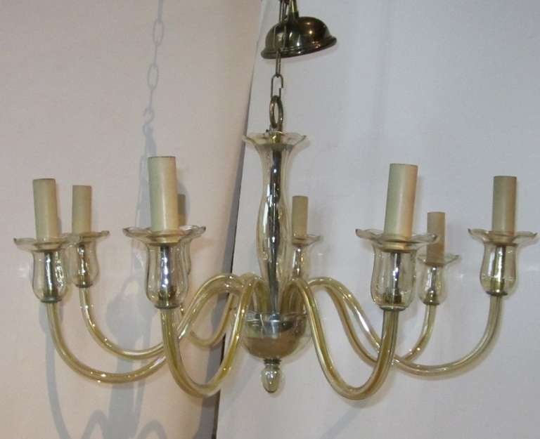 1940s Italian eight-arm Murano glass chandelier with beveled bobeche.
Recently rewired for the U.S.
Ceiling cap is provided.
Excellent condition.