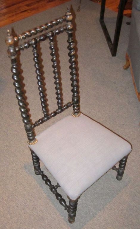 Classic Napoleon III spool leg chair. The seat cushion has been covered in vintage Belgian linen.