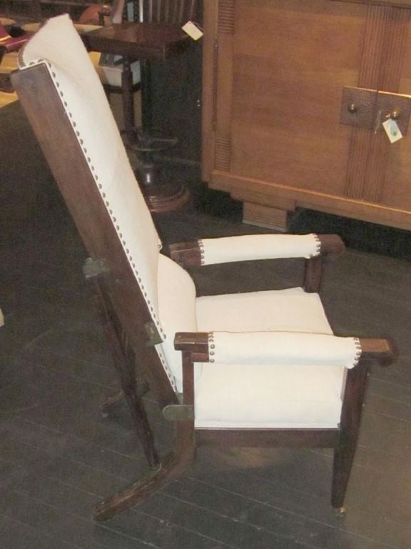 Original patient hysteria chair with adjustable back / original 4 brass caster wheels.
Recently reupholstered in vintage Belgian linen.