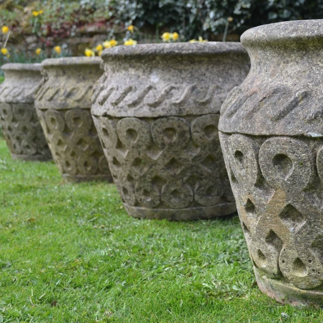 Circa 1920s English pair carved signed (Cotswold Studios) round stone planters.
Four pair are available.
Each pair priced separately at $3600.