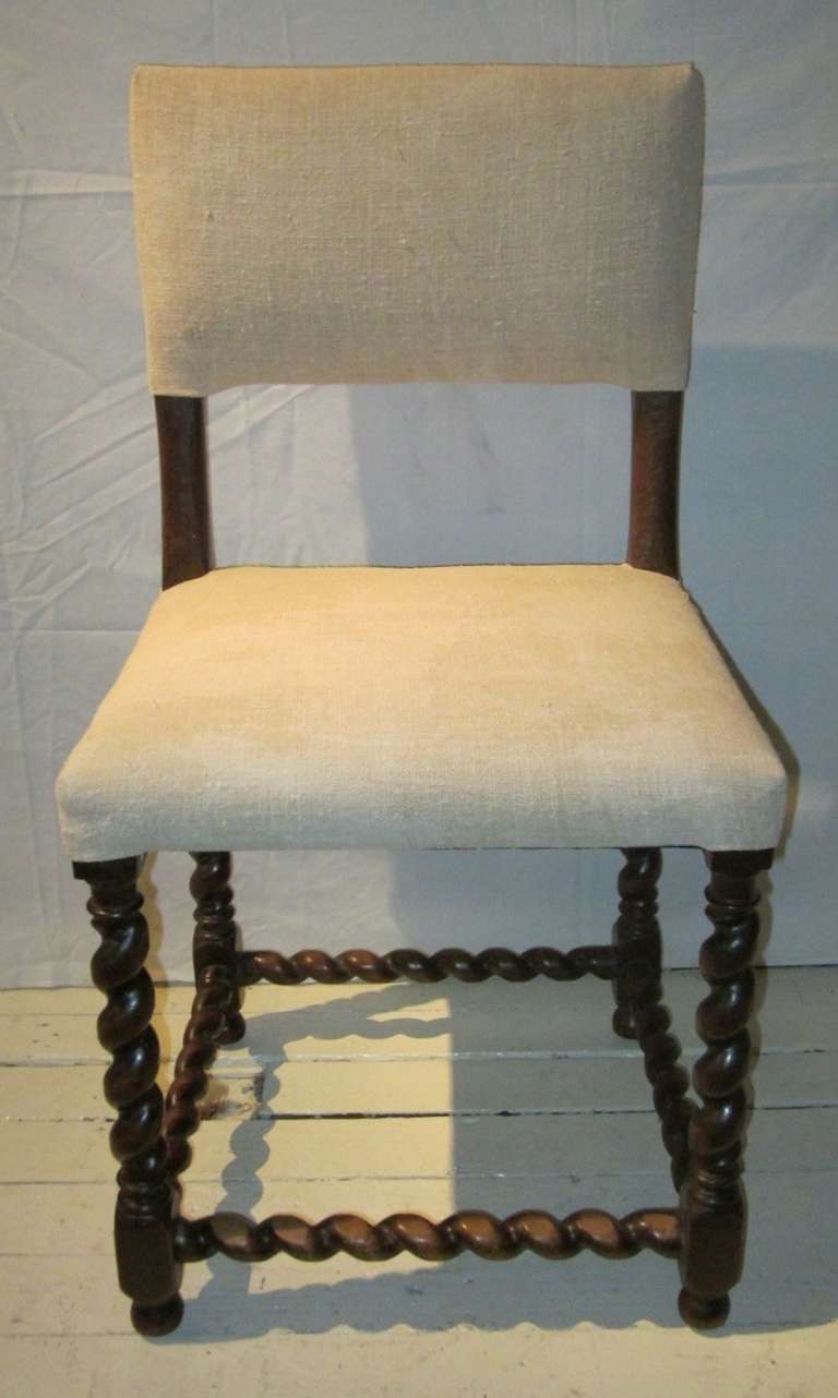 Classic dining chairs from Belgium. Twisted decorative frames.
Recently reupholstered in vintage Belgian linen.