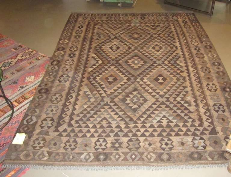 Neutral colored vegetable dyed wool Kilim.
Very unusual that it's in a neutral pallet.
Made in Eastern Europe.