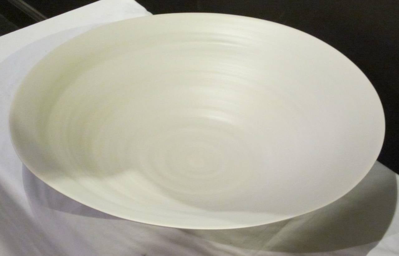 Contemporary Italian large deep fine ceramic bowl.
The organically shaped bowl has a beautiful linen color matte glaze.
This bowl is food safe.
We have a large selection of handmade Italian bowls in a variety of shapes, sizes and colors.
Bowls