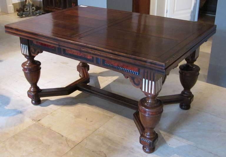 Rare Flemish circa 1900 extending dining room table with decorative inlay, a trademark of furniture designer Frans Franck of Antwerp, Belgium.
Opens to 109". Closed it measures: 59 L x 39 W x 32 HT.
