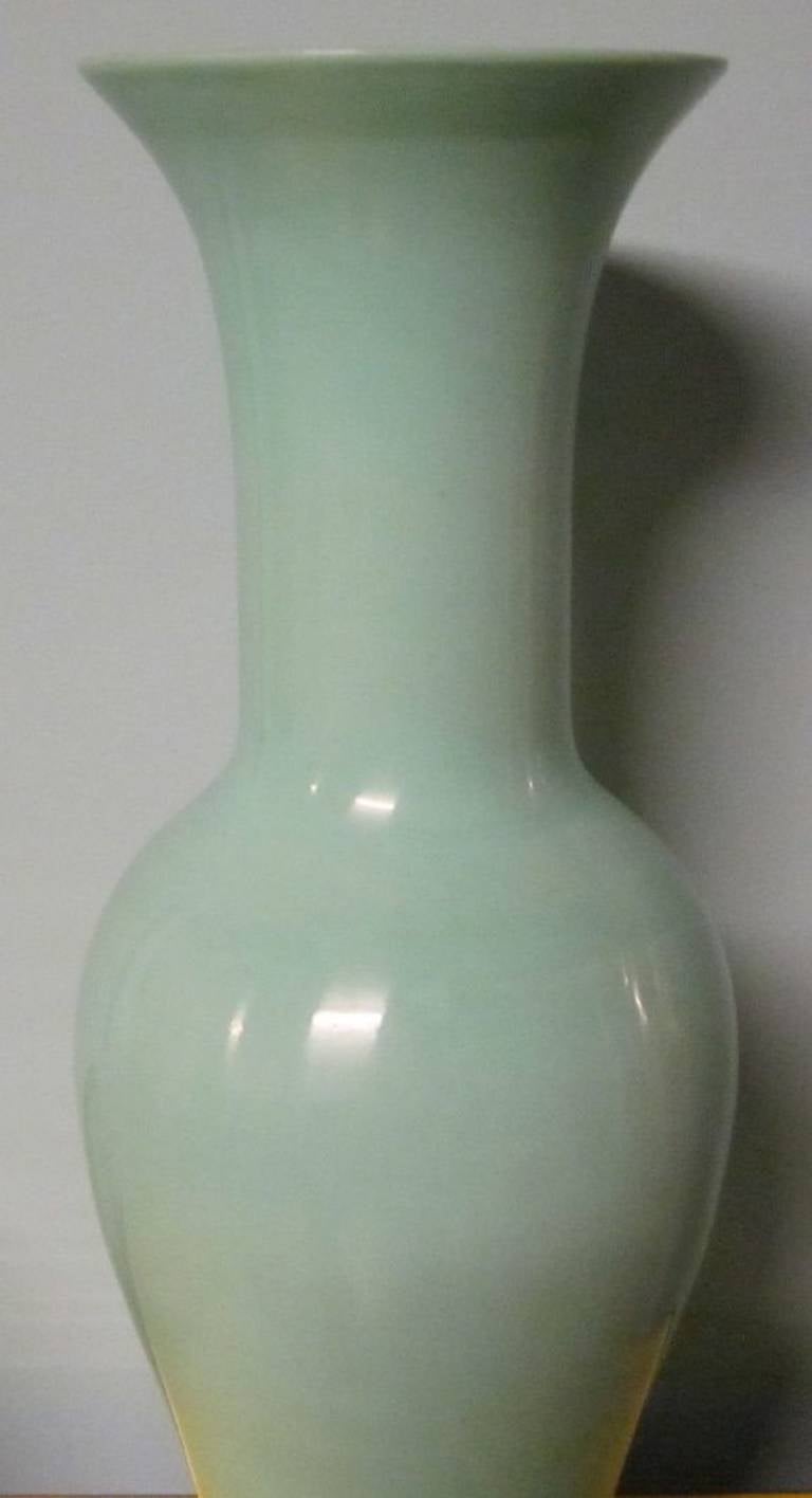 Contemporary Chinese pair of turquoise glass tulip shape vases.
The glass is 1/4