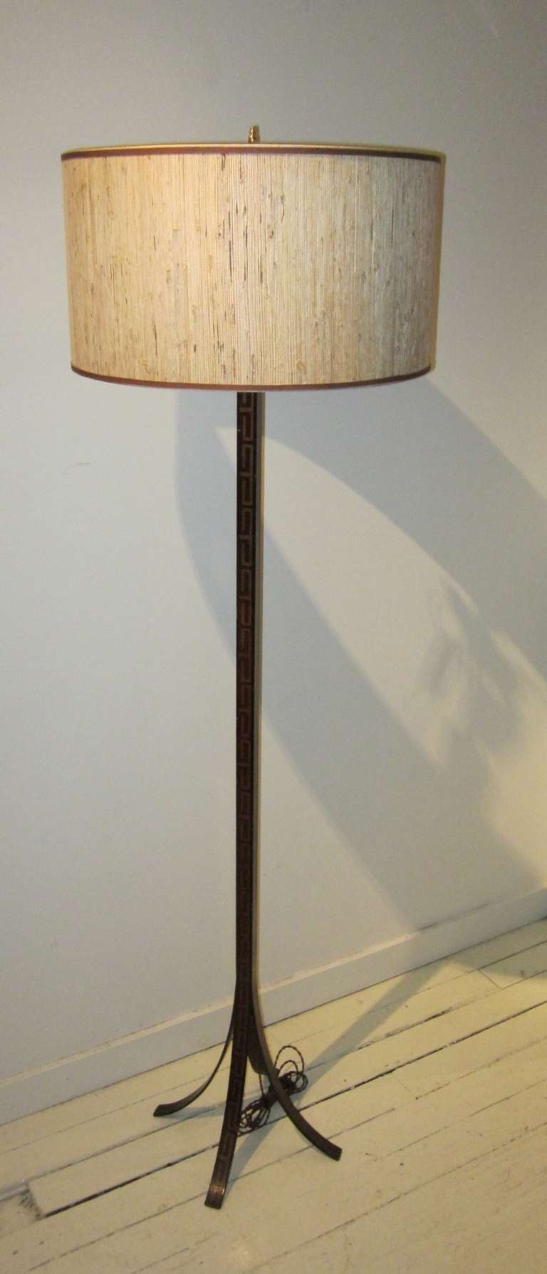 1960's Spanish designer Pierre Lottier signature iron floor lamp with decorative greek key motif
Newly rewired with new lamp shade
Overall height 67.5