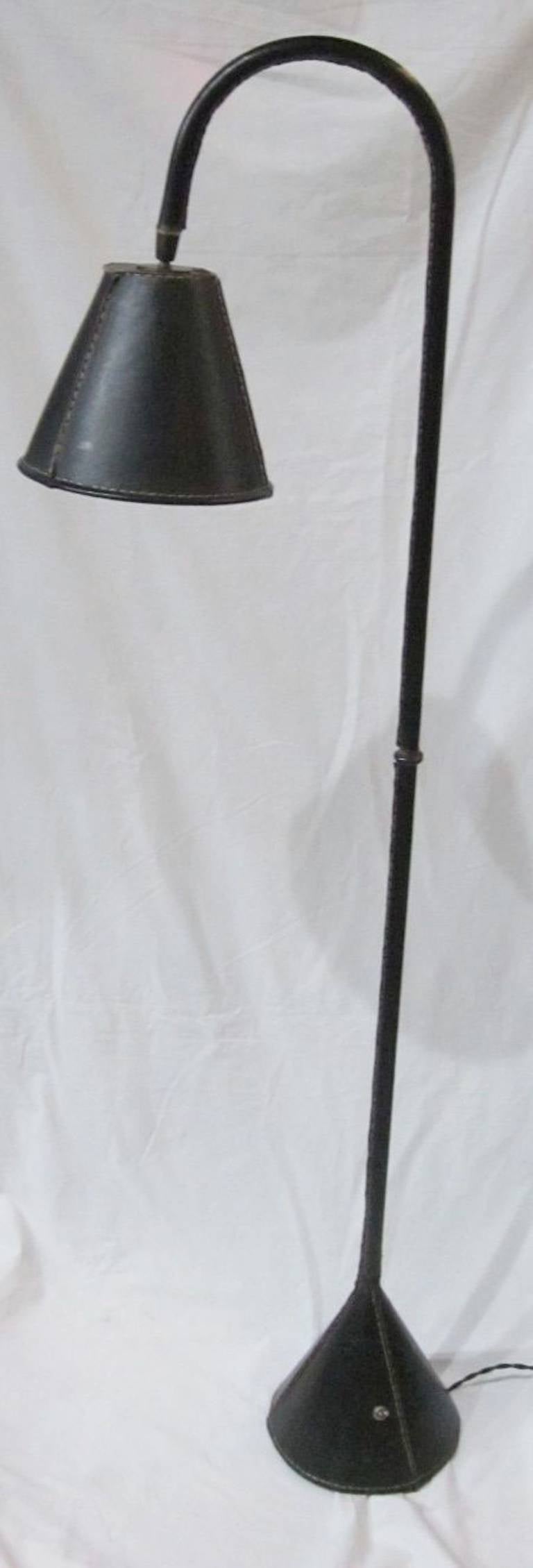 1960's Spanish mid century Valenti black leather floor lamp. Also available in cordovan color.