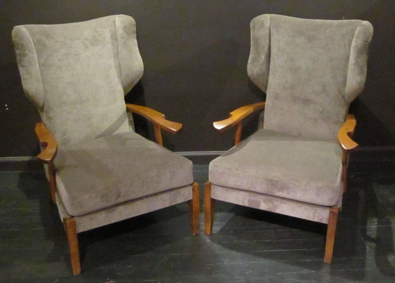 1960s Italian high back chairs with outward curved arms, recently reupholstered in brushed taupe fabric.
Excellent condition.