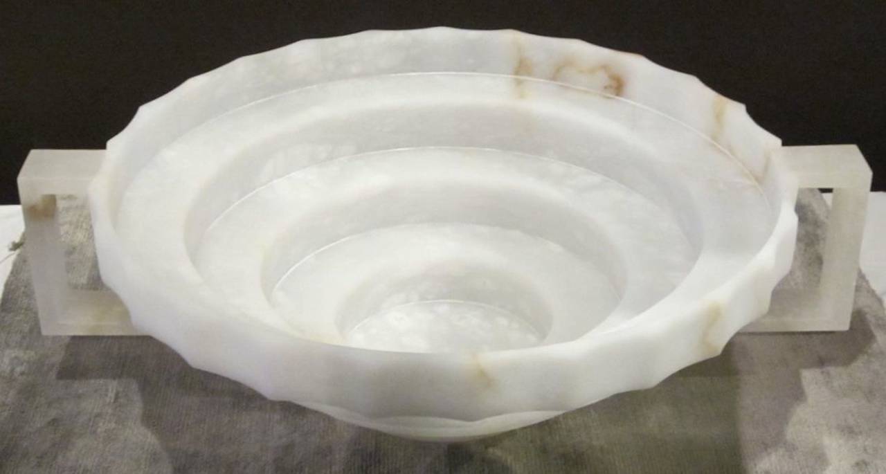 Contemporary Italian alabaster bowl with step design and two handles.
 