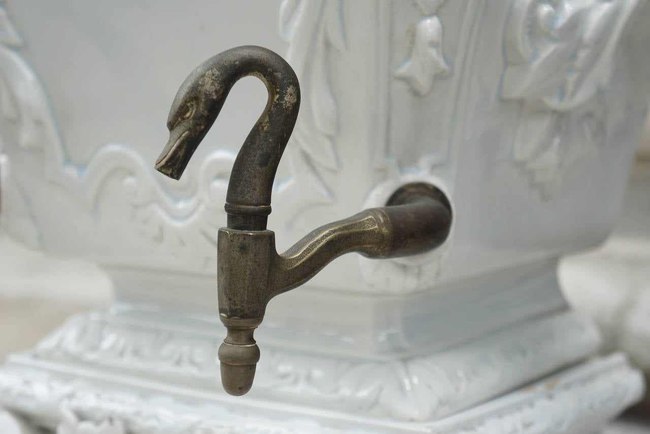 This fine a decorative water dispenser was designed and used as a source of water before full running water was available in houses and would have been replenished by servants in upper in come houses. Made in the Baroque style during the rein of