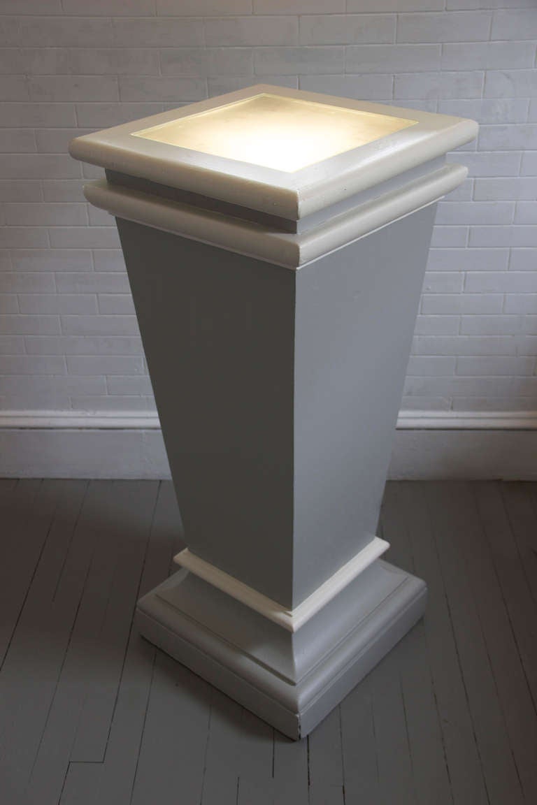 Bold and Striking Three and a Half Foot Tall Pedestals with a Glass Top. Illumination shies from below