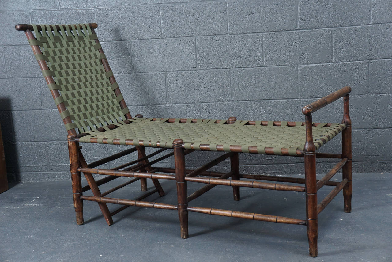 A unique object. "Adirondack" chaise with flat-woven seat and back.