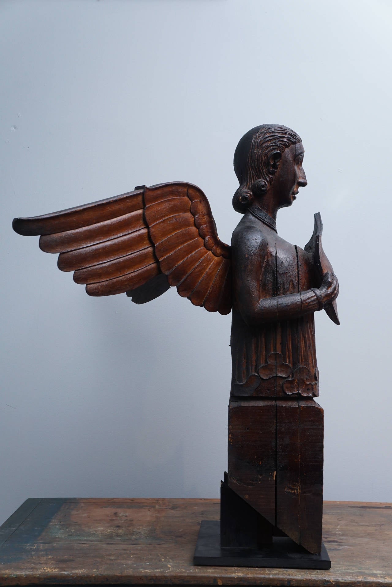 Large Carved Beatific Figure with Shield and Wings In Excellent Condition In Hudson, NY