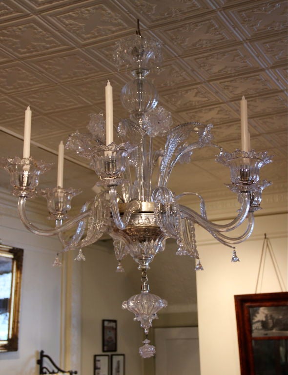 Beautiful early Italian glass chandelier made on the Island of Murano, where glass has been make into decorative objects for centuries. The chandelier once belonged to Edith Bel Geddes, the mother of Barbara Bel Geddes and hung in the dining room of
