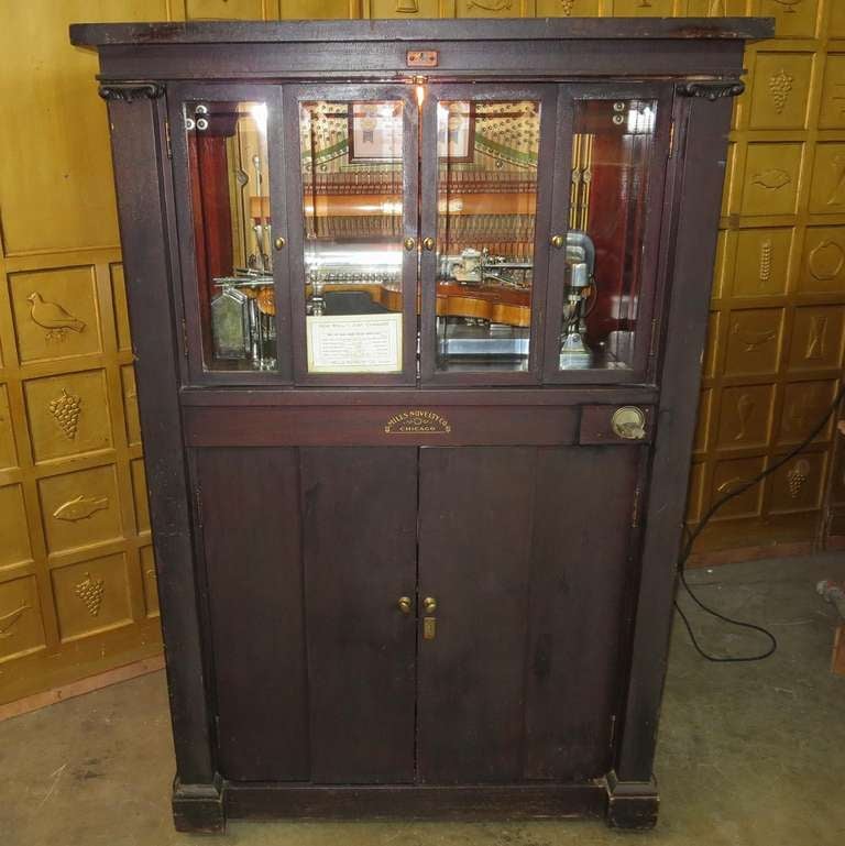 The Mills Company was founded in 1889, with its' first patents for coin operated machines. They grew to produce a number of coin operated machines, including slot machines, jukeboxes, and soda vending machines. The 