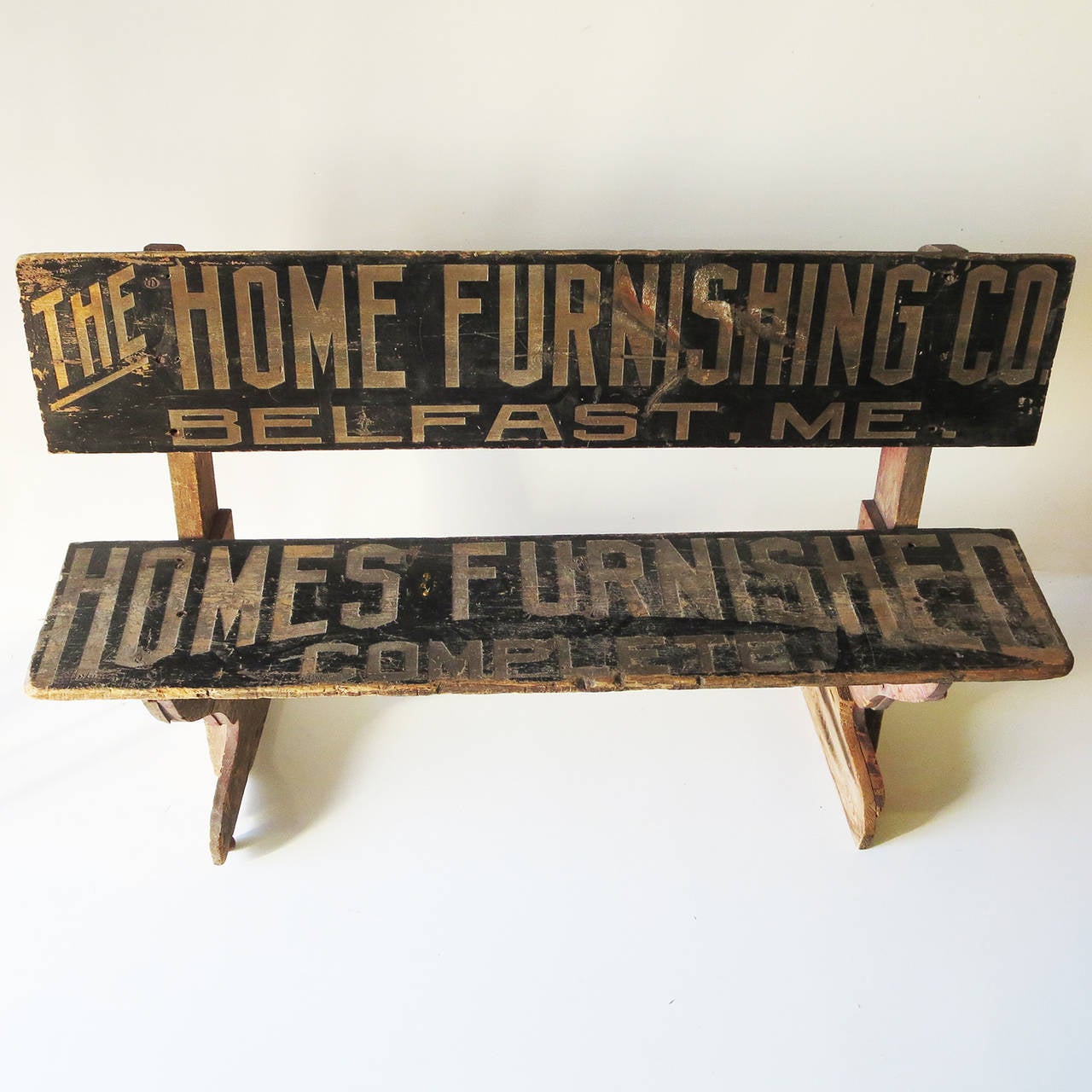 Provided by the Home Furniture Company of Belfast, Maine, this great bench was the ultimate in direct advertising. The seat and bench back are embossed, with lettering all slightly recessed into the wood. The bench is all original, and displays just