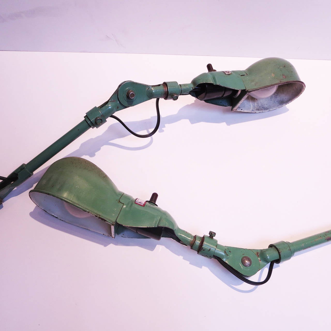 Industrial Painted Metal Articulated Lamps In Fair Condition For Sale In North Hollywood, CA