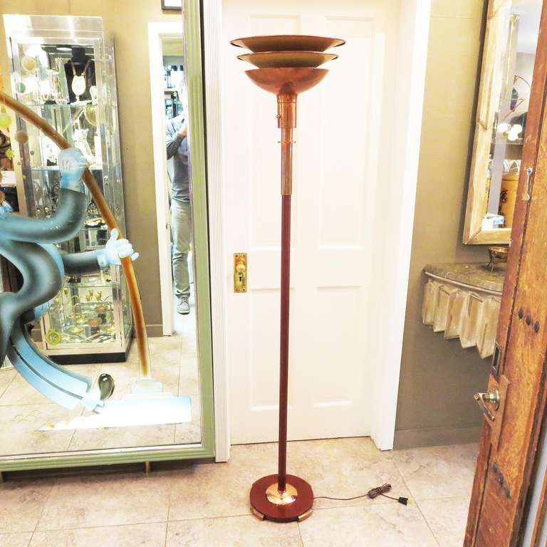 Designed by Gilbert Rohde for the Mutual Sunset Lamp Company (Brooklyn, NY) in the mid 1930's. The lamp shows original copper finish, with mustard under paint on the shades. The column and base were poorly repainted, and have now been brought back