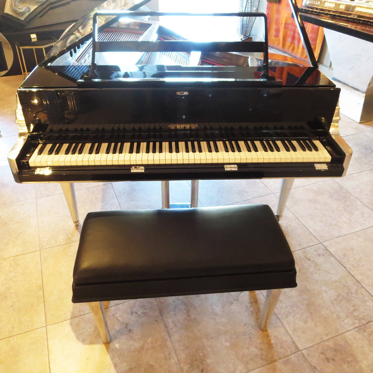 The Ultimate Rippen Piano in Polished Aluminum 1