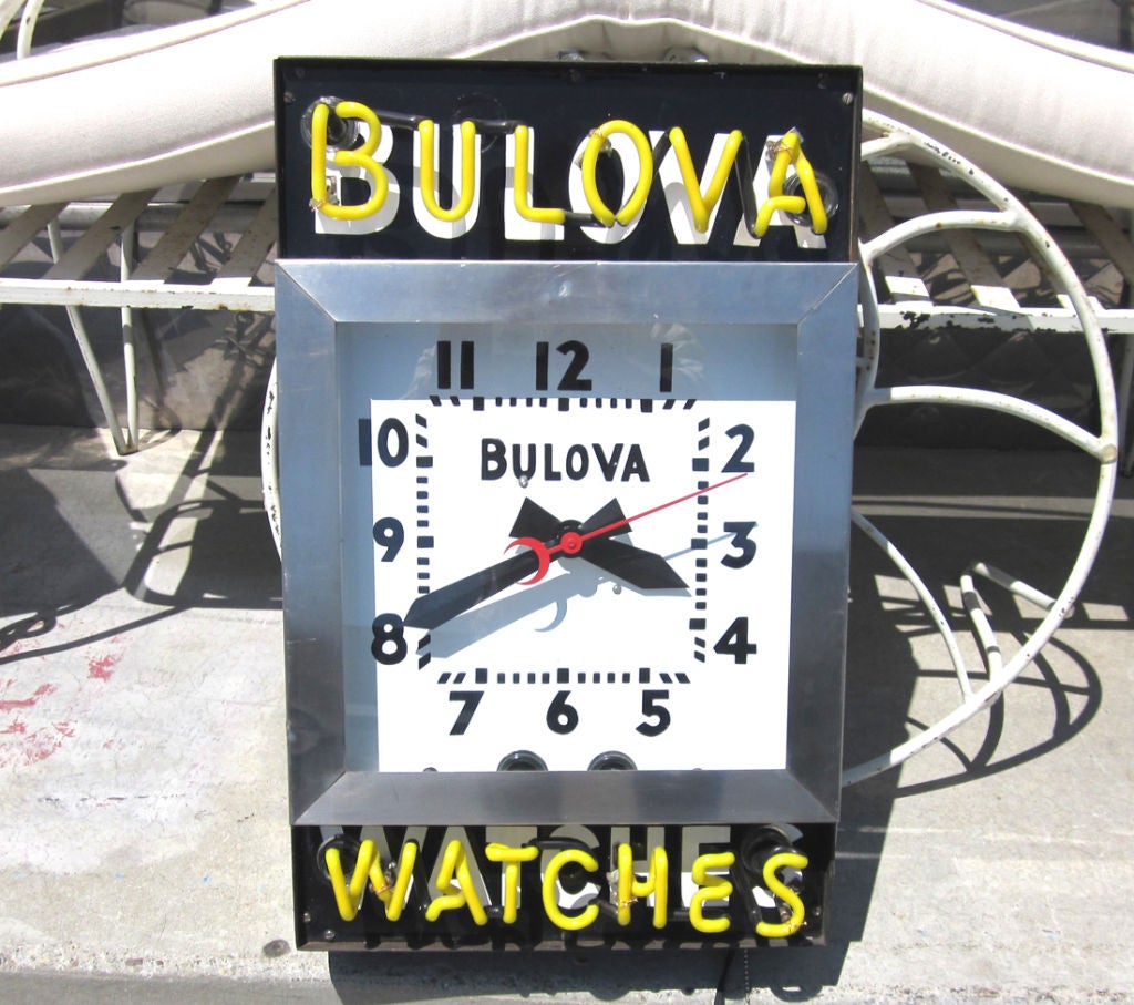 Designed to enhance sales in a jewelry store, this Bulova Watches neon clock is now ready to hang in your location! The face and lettering areas of the front are baked porcelain enameled steel, quite desirable in the collectibles world. The neon is