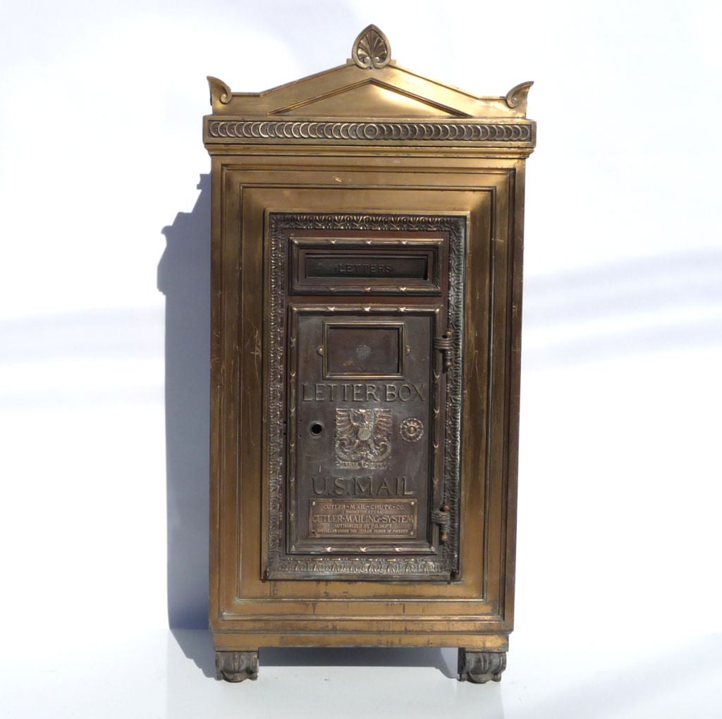 Used in prestigious public buildings and hotels in the 1930's, This gorgeous bronze letter box was an imposing presence in the lobby. The body would be set into the wall, while the framed front protruded out from the wall. It could be set up in this
