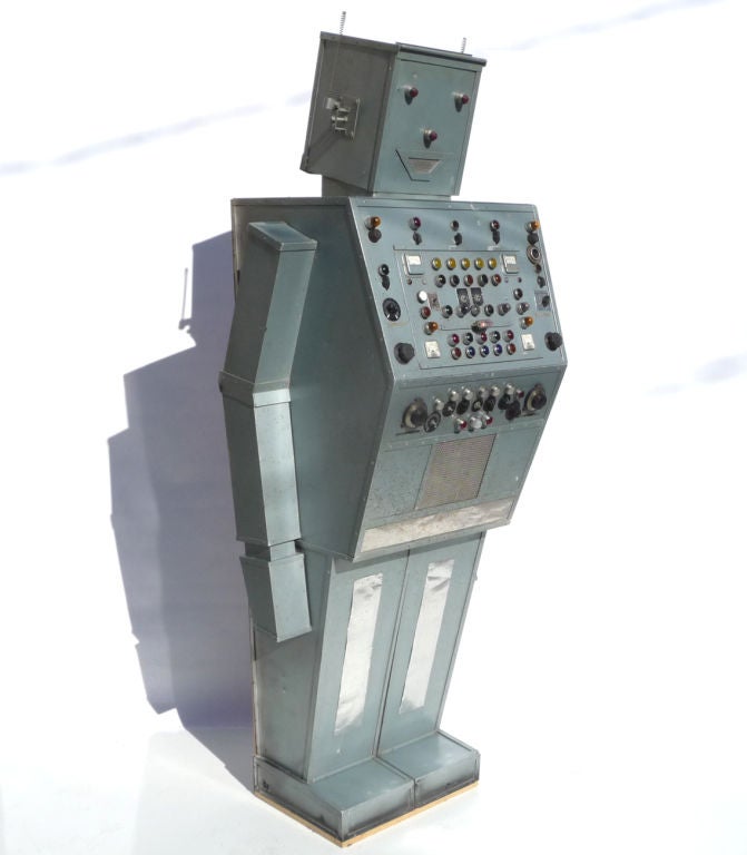 A great robot in an amazing scale! We don't know all the history here, but he was most likely a movie or television prop originally. He was later used by a Midwestern sign company to rent for promotions and store openings. One could run a recorded