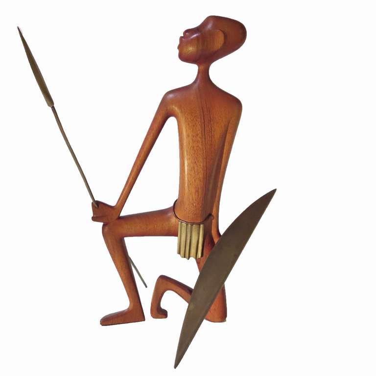 In the Art Deco 1930's, when other designers were streamlining trains and toasters, Hagenauer was creating stylized human and animal forms. As the African motifs were very prevalent in Art Deco design, our spear wielding native was a popular theme.