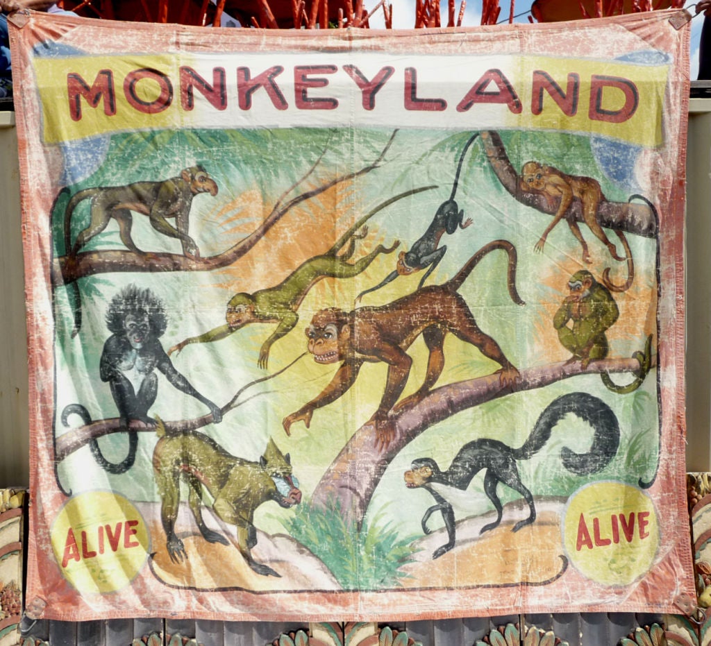 A wonderful image hand painted onto canvas depicting an array of different monkeys. The banner was created by the O'Henry Tent and Awning Co. for Ringling Brothers Circus, and is marked and dated in the corner. The painting shows fading consistent