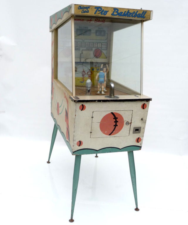 Of the many coin operated arcade machines we have had over the years, one of our favorites is this mechanical basketball game. It truly is a game of skill, as timing and precision are both in play to sink a basket. After inserting a quarter, the