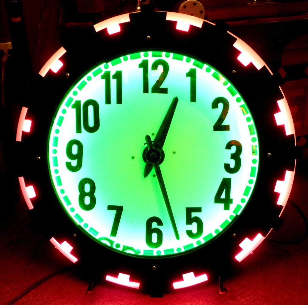 Certainly one of the more distinctive designs in neon clocks, this was marketed in a very unique manner. Going for the regional markets, the clock was an 
