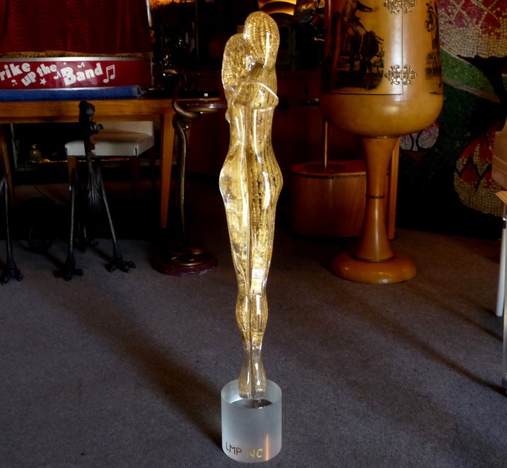 At twice the size of the largest Lovers sculptures offered, this gold filled glass form is both impressive and historical. Presented as a wedding gift to Lisa Marie Presley and Nicolas Cage in 2002, the base is actually etched with their initials,