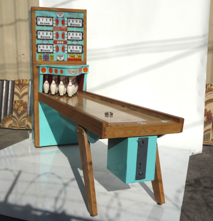 No respectable arcade would be complete without a good bowling game, and this United six player is a winner! The fun part of the game is that six players can all play together, each alternating frames, as in a real bowling experience. The cabinet is